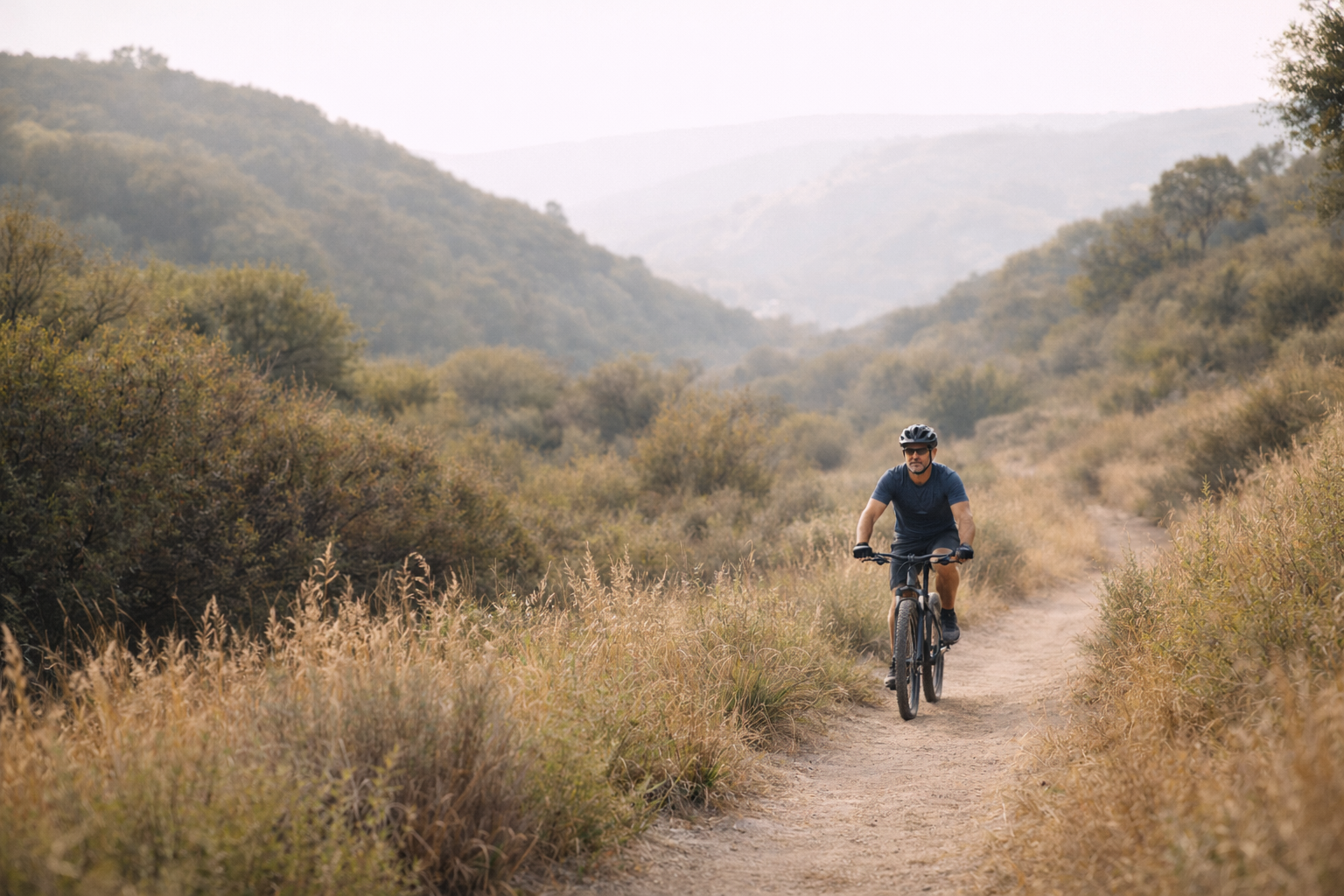 Mountain biking on a trail — Dr. Crane's active lifestyle outside the clinic